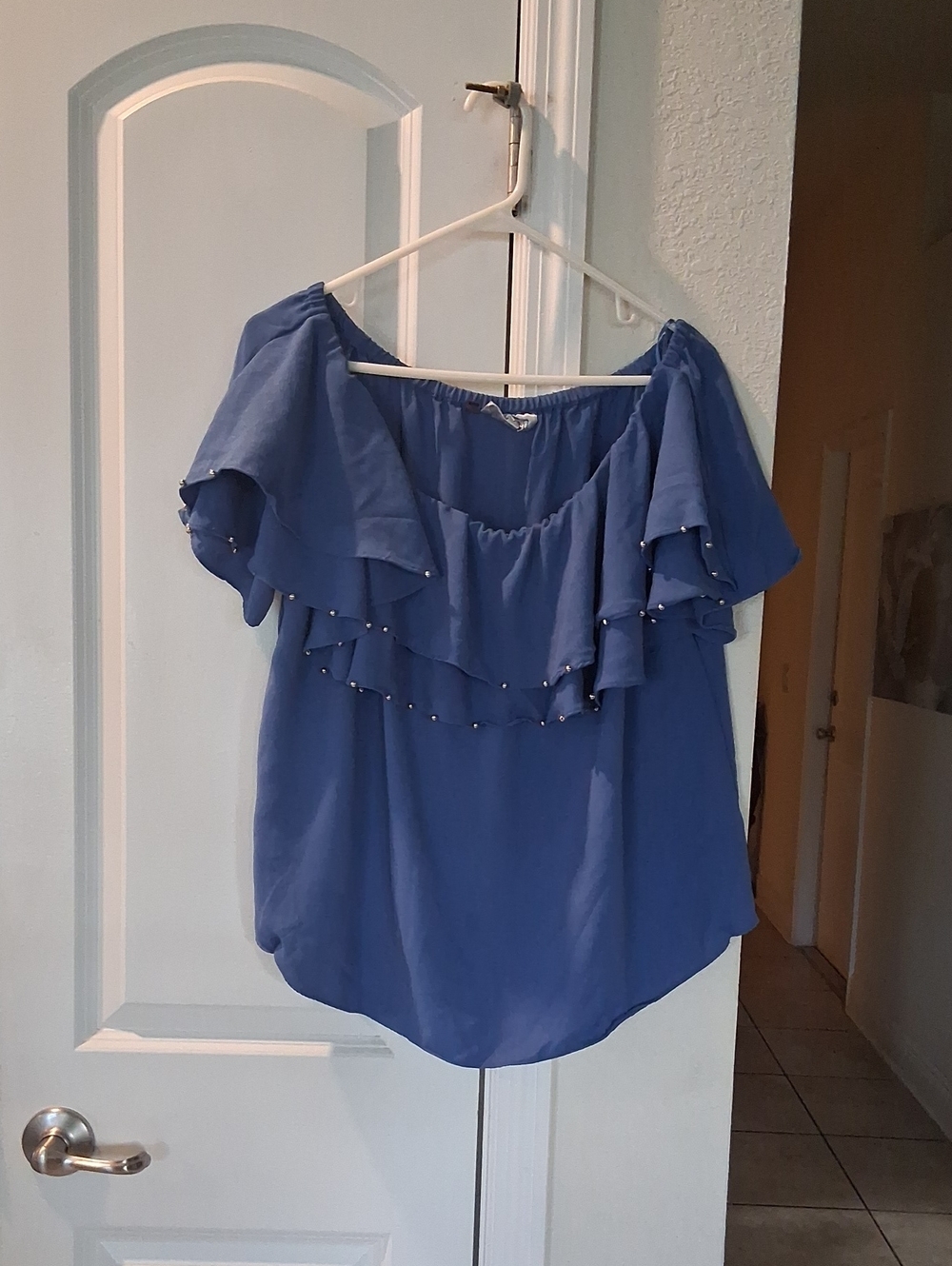 Jennifer Lopez Blue Off-the-Shoulder Ruffle Top